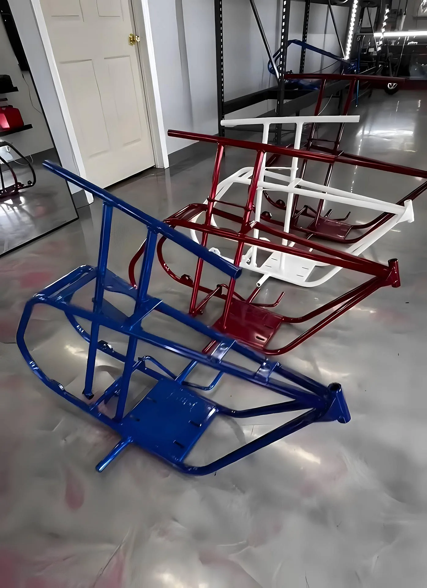Blue, red, and white go-kart GTS frames